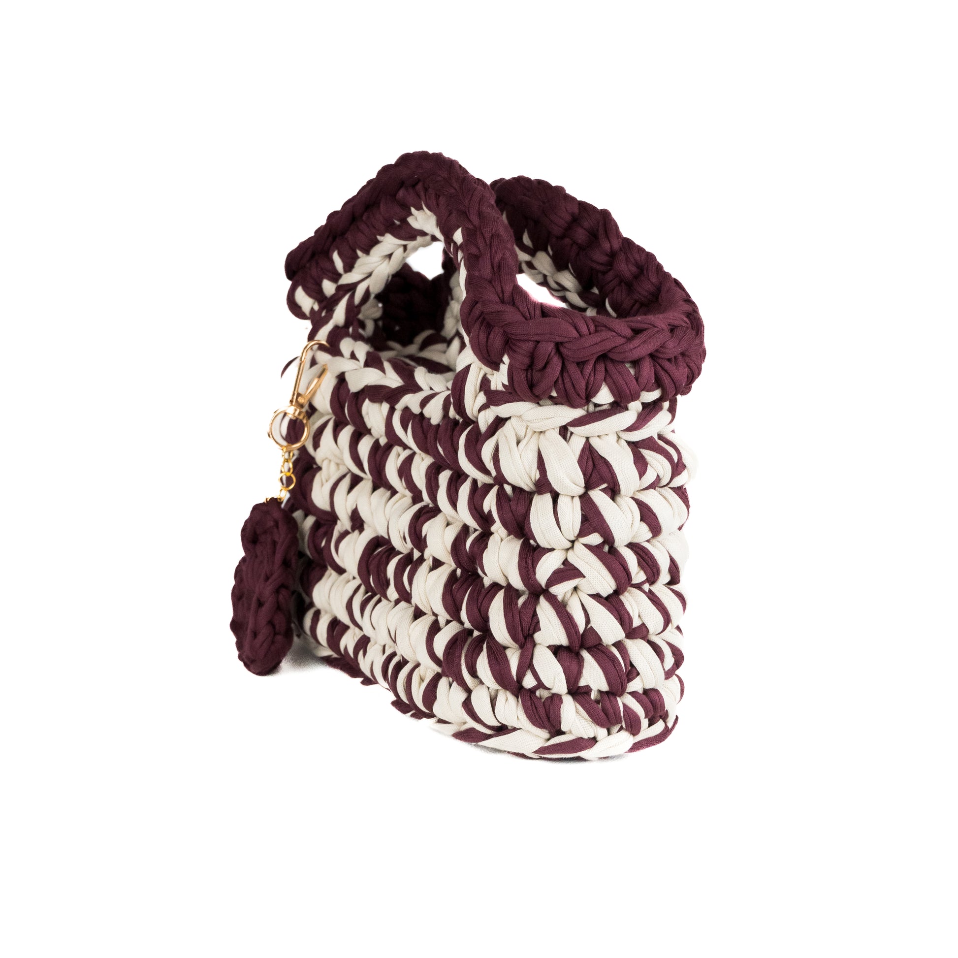 Minibag realizzata a mano all'uncinetto con fettuccia in cotone, bicolor.