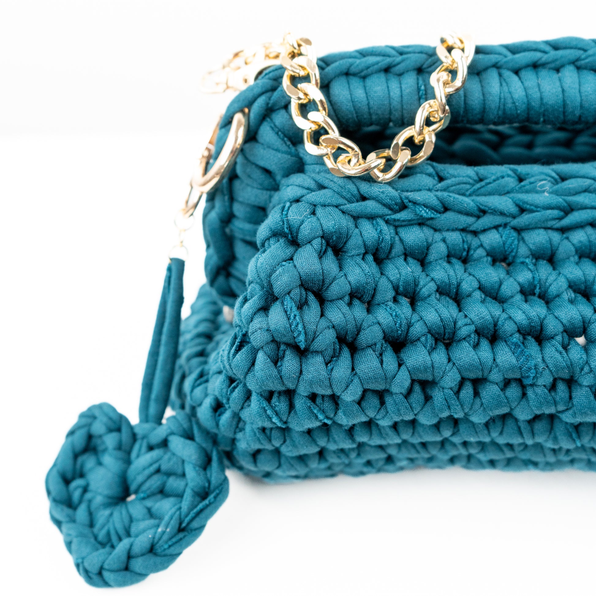 Clutch realizzata all'uncinetto petrolio 
