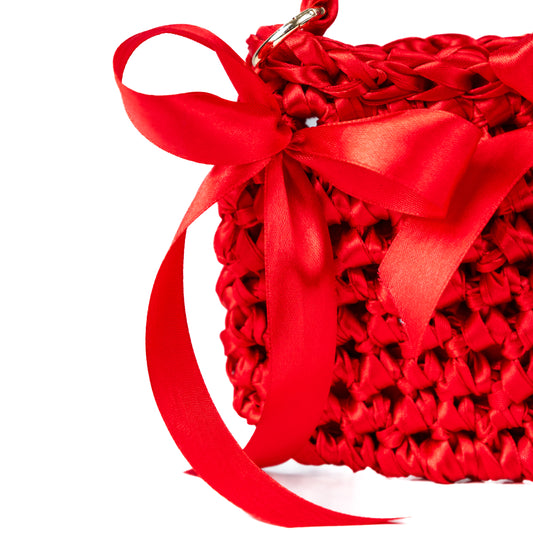 Mini bag capodanno in raso con fiocchi rossi. Borsa feste 